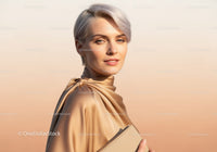 Elegant Woman with Short Silver Hair Wearing Beige Silk Blouse
