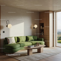 Modern living room with green curved sofa and natural light