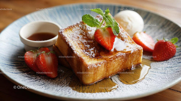 Delicious French Toast with Strawberries and Ice Cream on a Plate