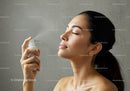 Women Applying Facial Mist for Skincare and Hydration