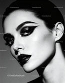 Elegant woman with dramatic black makeup closeup