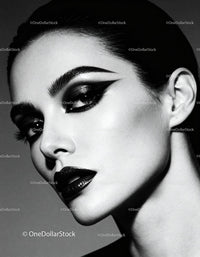 Elegant woman with dramatic black makeup closeup
