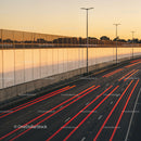 City Highway with Light Trails During Sunset in Urban Environment