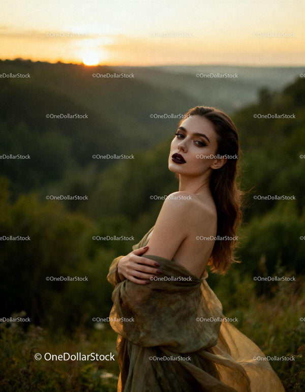 Elegant woman posing in nature at golden hour