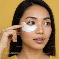Woman Applying Under-Eye Gel Patch for Skincare Routine