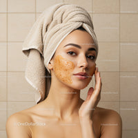 Young Woman with Facial Mask and Towel after Beauty Treatment