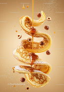 Swirling Pancakes with Hazelnuts and Maple Syrup Drizzle