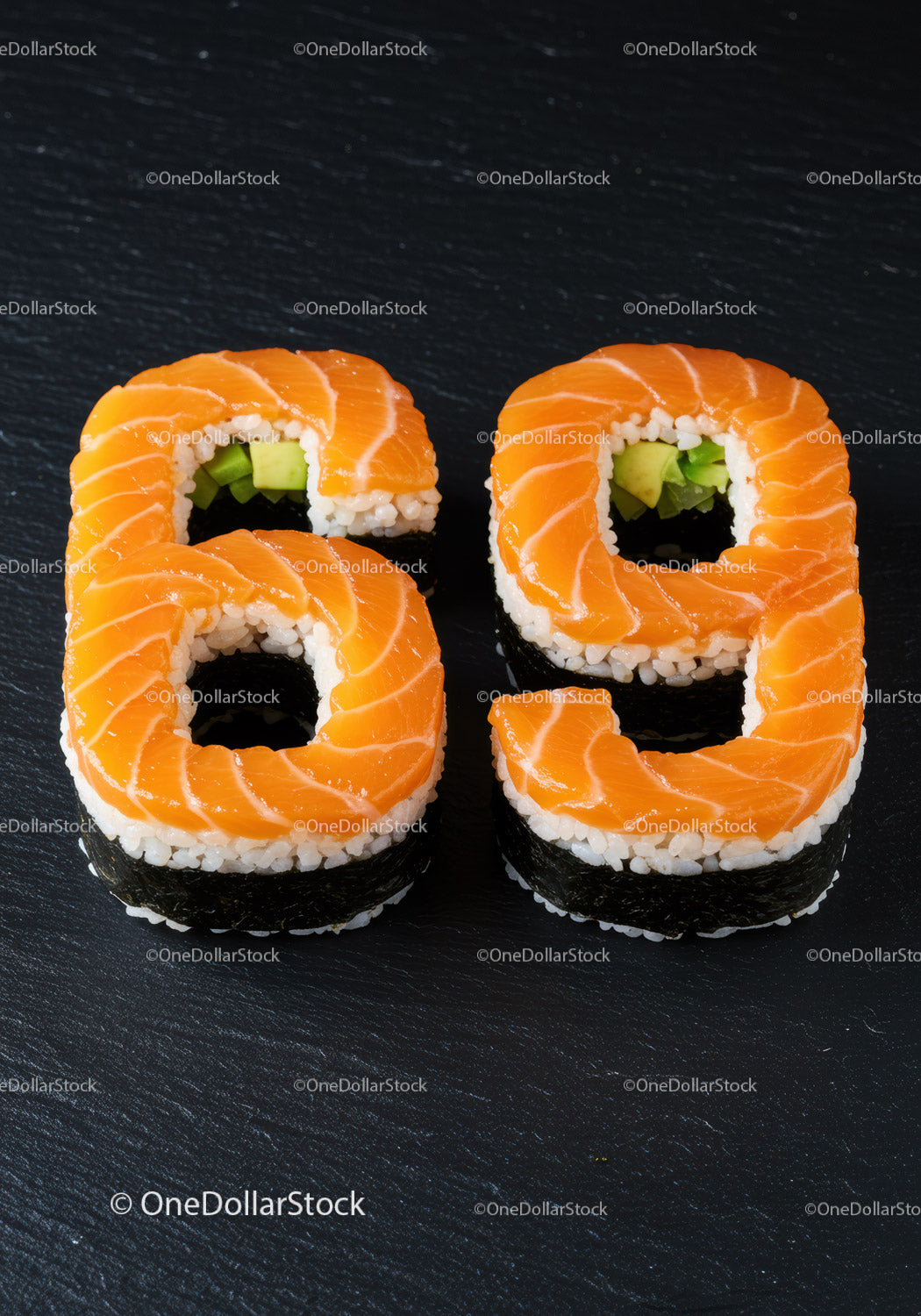 Sushi rolls shaped as number sixty nine with salmon topping