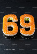 Sushi rolls shaped as number sixty nine with salmon topping