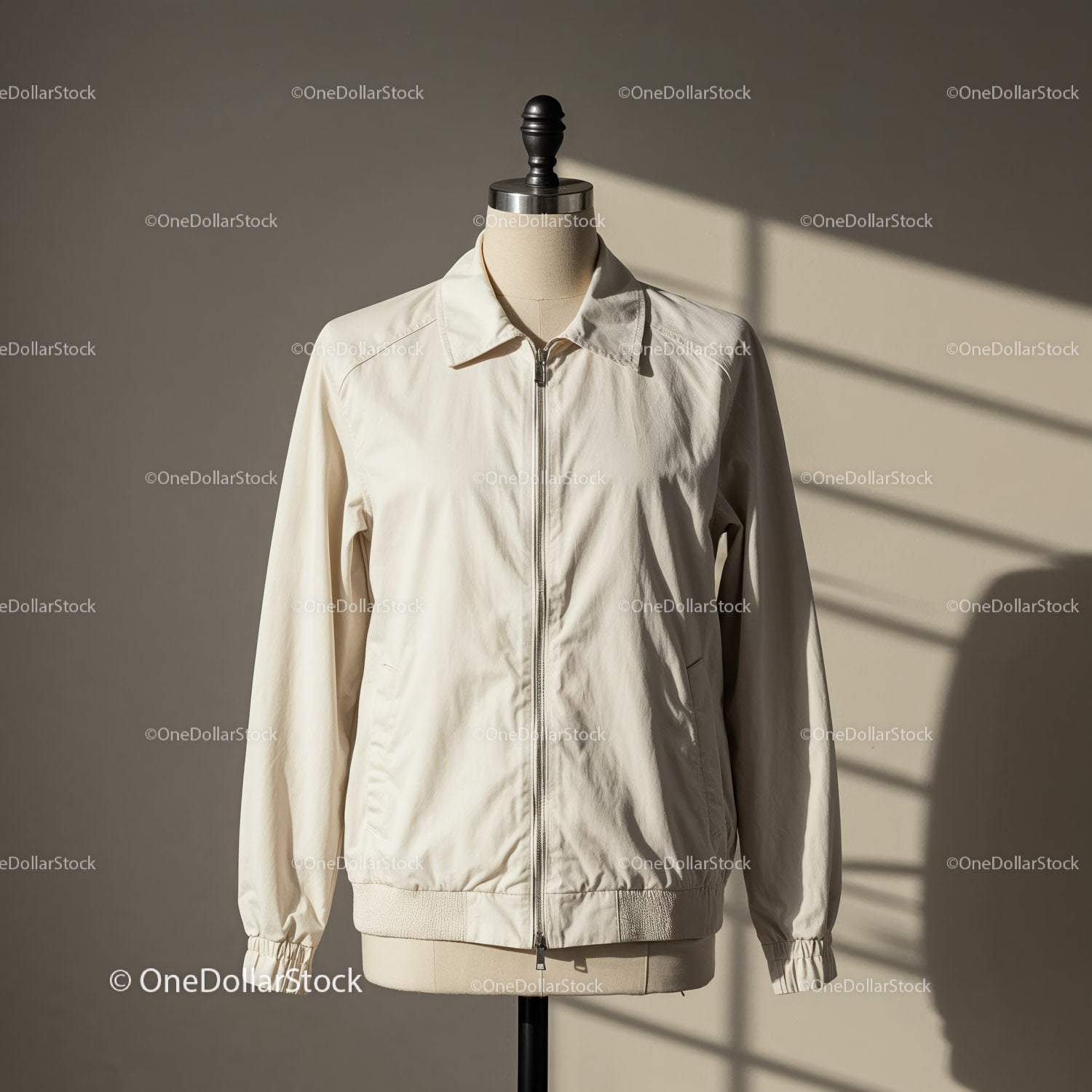 Light beige casual jacket on tailor mannequin