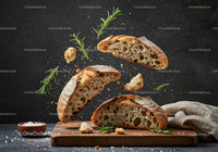 Rustic sourdough bread with fresh rosemary and salt