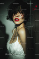Elegant Woman with Red Lips in Stylish Evening Dress