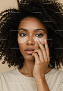 Portrait of a Woman with Curly Hair Wearing Under-Eye Patches