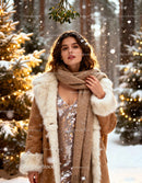 Woman in Fur Coat Standing Among Snowy Christmas Trees