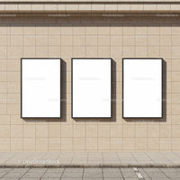 Three Blank Vertical Posters on Outdoor Stone Wall