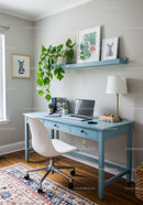 Stylish Modern Home Office with Blue Desk and Green Plant Decor