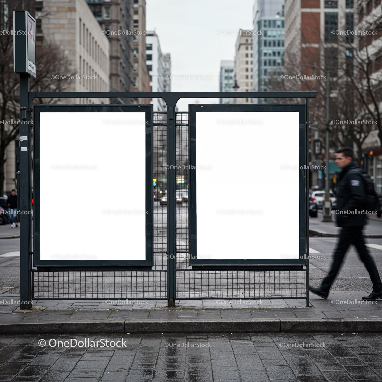 Empty urban billboard panels on city street crossing