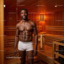 Healthy Young Man Relaxing in Sauna with Wooden Interior