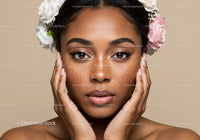 Close-Up Portrait of a Woman with Floral Crown and Freckles