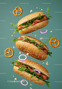 Fresh hot dogs with arugula and onions on blue background