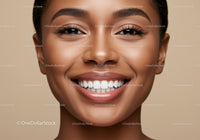 Close up of smiling woman with flawless skin and white teeth