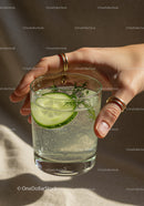 Refreshing Cucumber Infused Sparkling Water in Hand