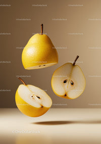 Floating yellow pears with halves on beige background