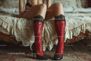 Chic Black Heels and a Red Lace Dress in a Cozy Bedroom Setting