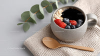 Berry and Granola Breakfast in Ceramic Mug with Coffee