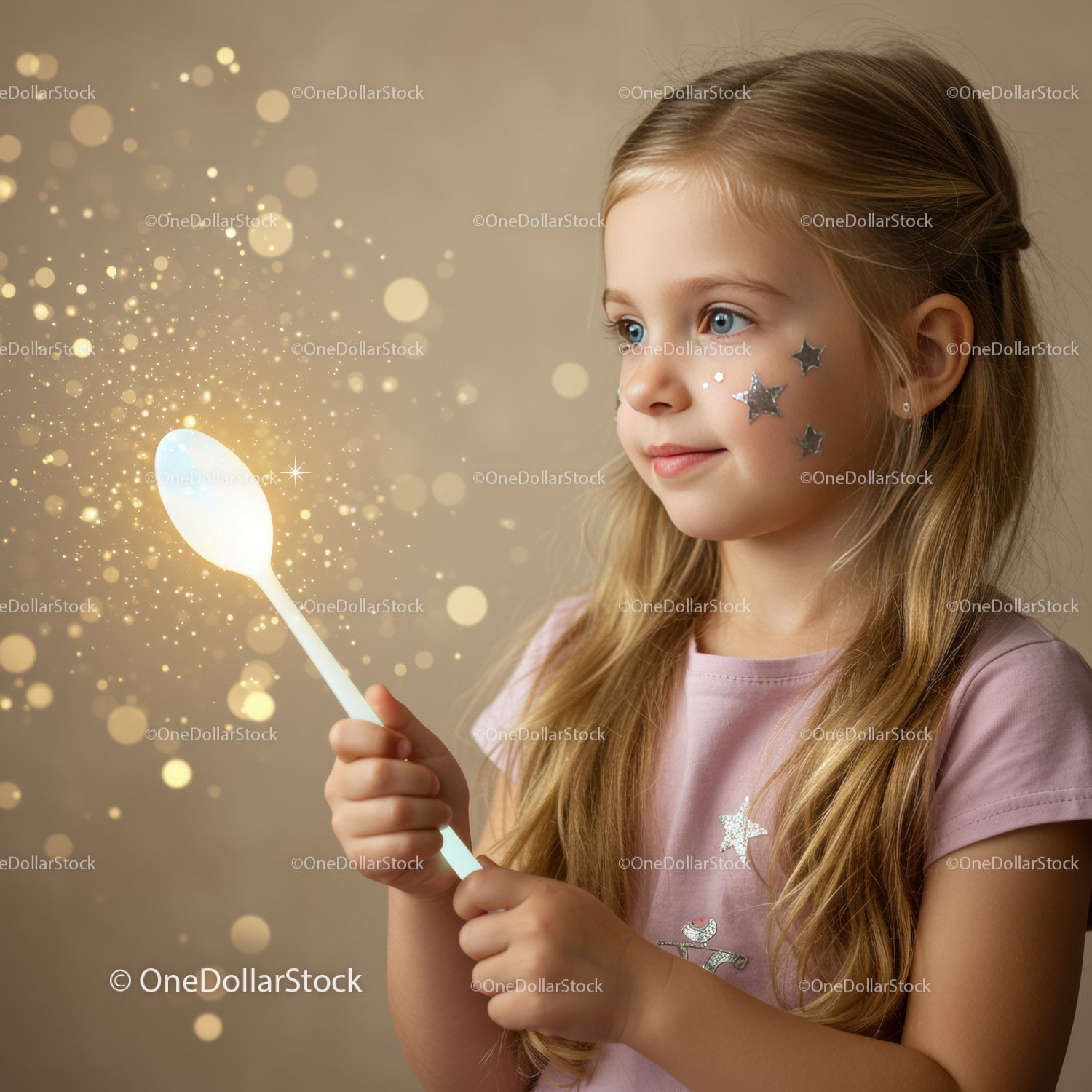 Little girl with magical glowing spoon and star stickers