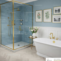 Elegant bathroom with blue tiled shower and white bathtub