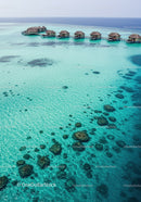 Overwater Bungalows Over Turquoise Coral Reef in Tropical Paradise
