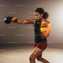 Focused woman boxing with intense motion blur effect