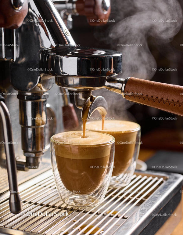 Fresh espresso pouring from professional machine