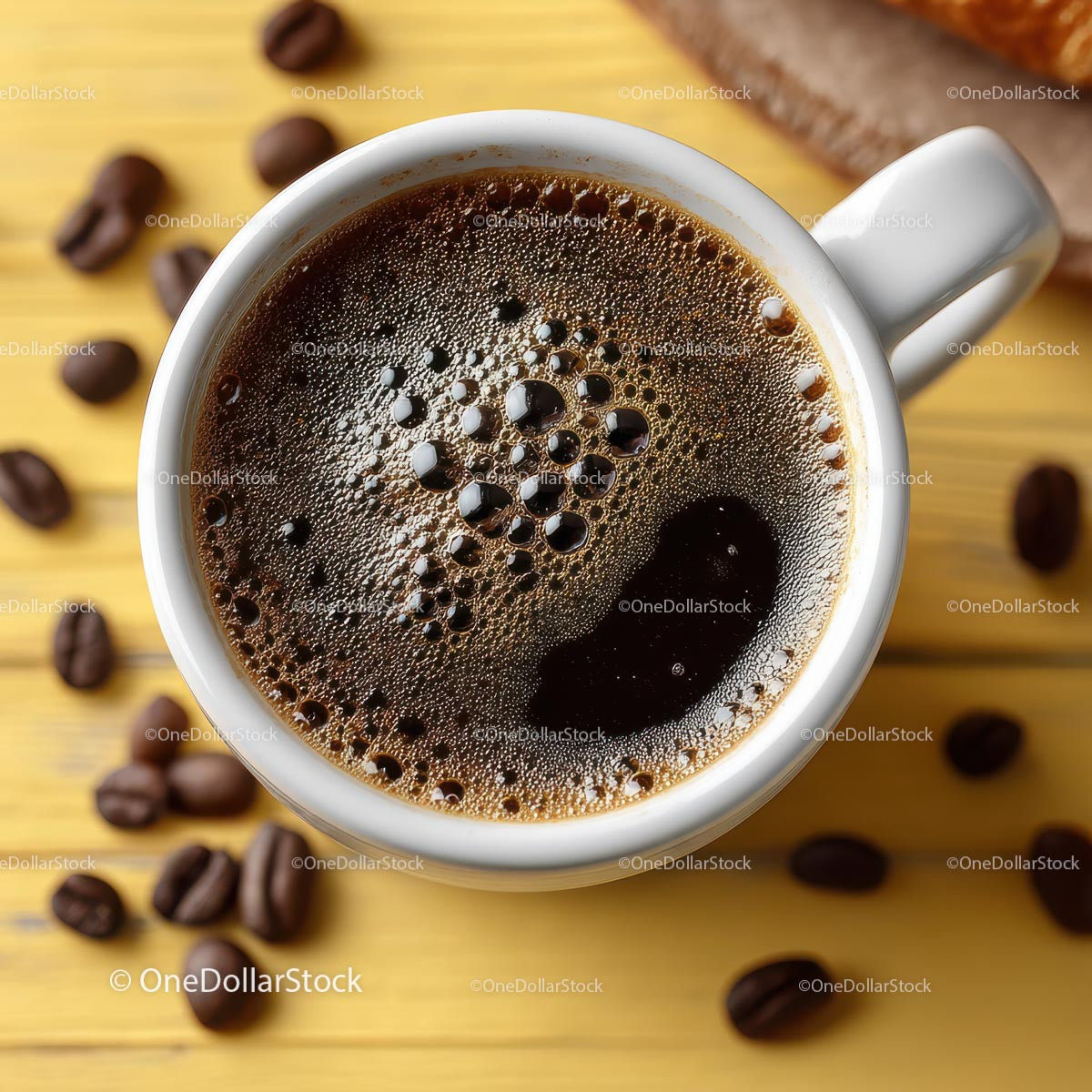 Delicious Coffee in a White Cup with Roasted Beans on Wooden Plate