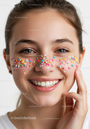 Smiling Woman with Colorful Sprinkles on Face and Bright Expression