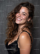 Young Woman Smiling Portrait with Wavy Hair and Black Lace Top