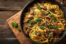 Beef and Mushroom Pasta in a Cast Iron Skillet with Cherry Tomatoes
