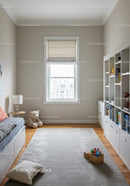Modern Nursery Room with Minimalist Decor and Natural Light