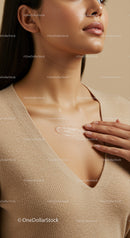 Close-Up of Woman Applying Moisturizer to Neck for Skin Hydration