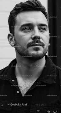 Black and White Portrait of a Young Man with Stylish Hair and Facial Hair