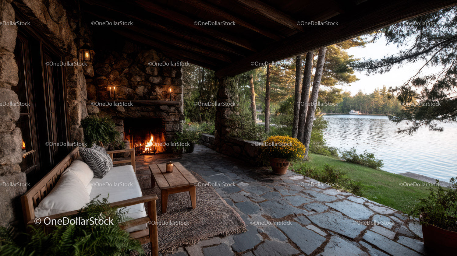 Serene Lakeside Outdoor Lounge with Fireplace and Nature View