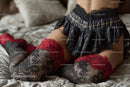 Chic Black Heels and a Red Lace Dress in a Cozy Bedroom Setting