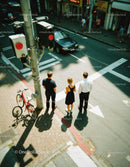 Urban Street Scene with Pedestrians and Vehicles at Crosswalk