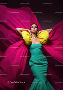 Fashion Model in Vibrant Pink and Yellow Flowing Gown