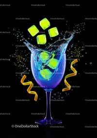 Vibrant splash of ice cubes in glass with lemon twist