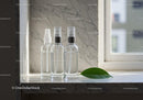 Minimalist Clear Spray Bottles on Marble Windowsill