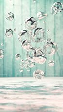 Close-up of Water Bubbles with Reflection in a Light Blue Background