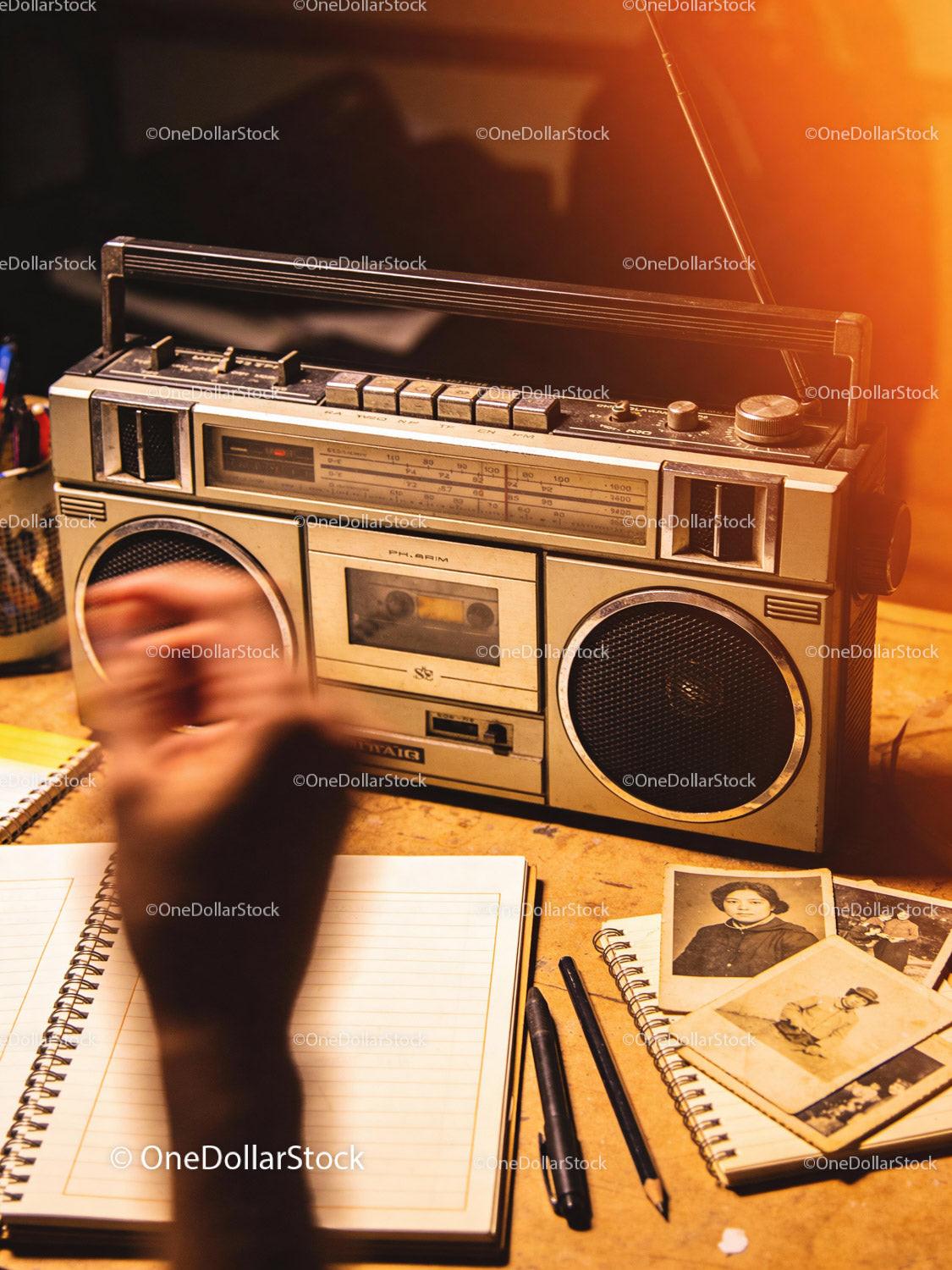 Vintage Boombox and Nostalgic Memory Collection on Desk