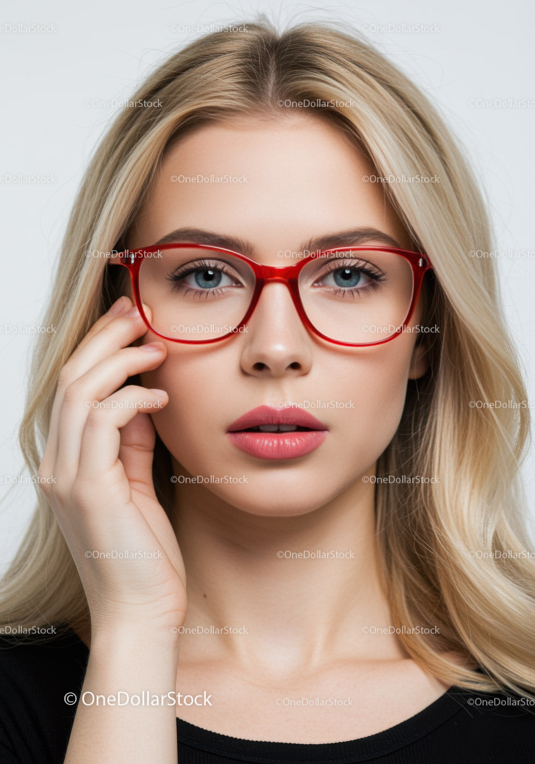 Portrait of a Stylish Blonde Woman Wearing Red Glasses and Light Makeup